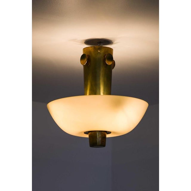 Modern Scandinavian Ceiling Lamp in Brass and Opaline Glass by Paavo Tynell, 1950s For Sale - Image 6 of 11