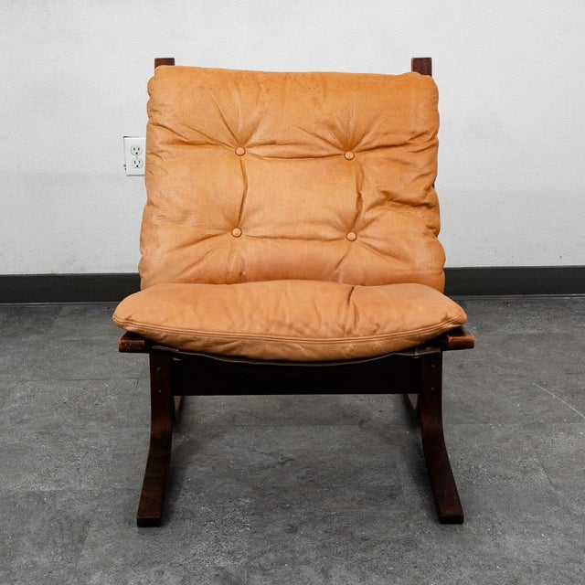 Ingmar Relling for Westnofa tan leather and bentwood chair. Made in Norway. Comes with original leather and is very...
