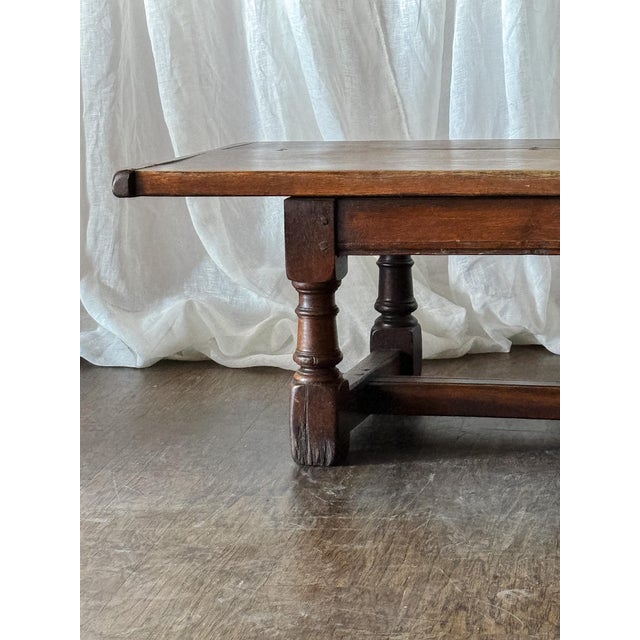 This handsome French rectangular coffee table brings a warm, rustic elegance to the room with its rich wood finish and...