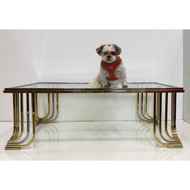 Bianci Firenze 1970s Italian Brass and Chrome Coffee Table with Glass Top 51" w x 29.5" d x 19" h Offered for sale is an...