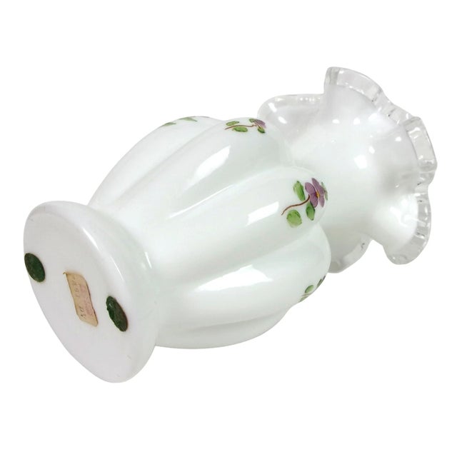 This stunning vintage Fenton melon vase showcases the timeless "Violets in the Snow" pattern, produced in the late 1960s....