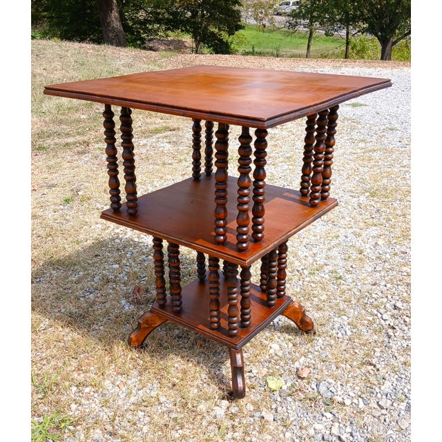 Antique Maple Victorian Hunzinger Style Library Stand 1890s An antique maple library or parlor stand in the Victorian...