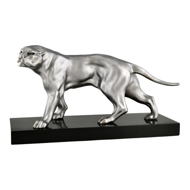 This elegant Art Deco panther sculpture by Limousin is a striking example of French decorative sculpture from the 1930s....