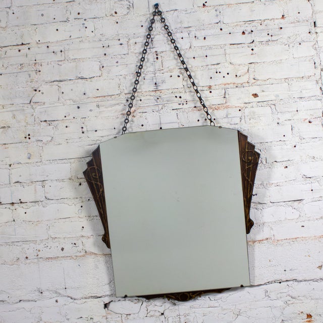 Lovely vintage Art Deco hanging mirror with decorative carved wood lower detail and fanned side panels and original metal...