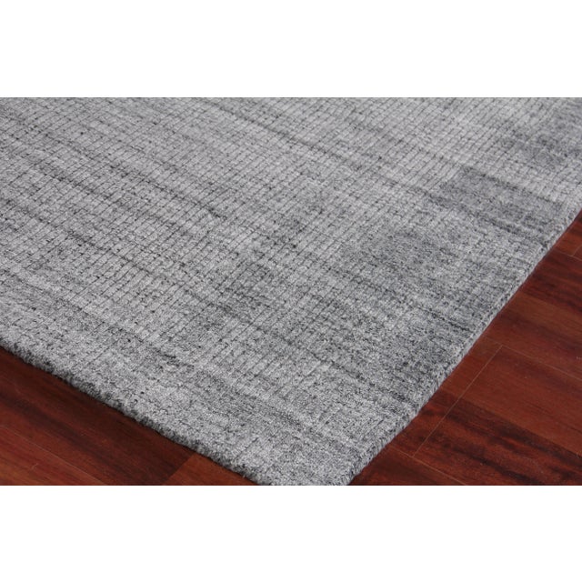 The perfect foundation to any room. The Hamm rug with its rich, saturated color and luxurious bamboo silk will complement...