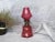 This antique cranberry glass oil lamp is a beautiful and authentic Victorian era home decor accent. Miniature in size, the...