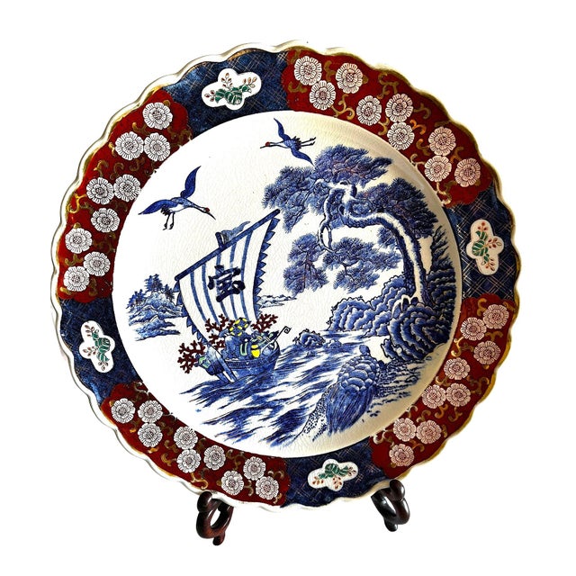 The object is a beautiful classic Japanese Imari charger from early to Mid 20th century. It is a high quality later Imari...