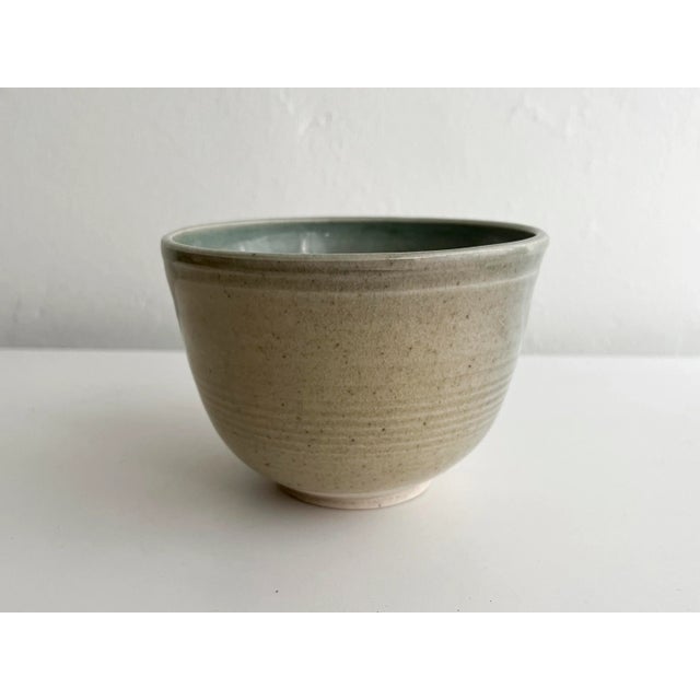 Small handmade ceramic bowl, vintage 1989 Sage green and tan coloring Signed Rosita Very good condition. Crazing and a...
