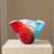 Large hand-blown studio art glass vessel featuring bold fields of turquoise blue, red and white with expressive black...
