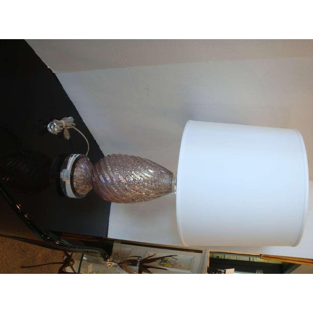 This is a vintage lavender Murano glass lamp on Lucite base.