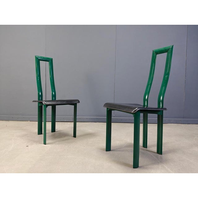 Italian Model Regia Dining Chairs by Antonello Mosca for Ycami. Green aluminum frames with black leather seats. Timeless...