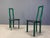 Italian Model Regia Dining Chairs by Antonello Mosca for Ycami. Green aluminum frames with black leather seats. Timeless...