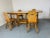 Mid Century Finnish solid pine wood dining set with dropleaf table and 4 matching chairs. Table has a drawer which can be...