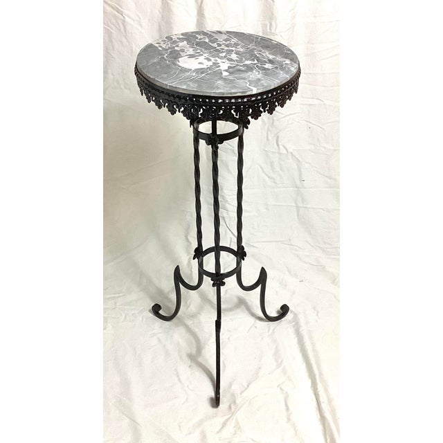 Antique Round Black & White Marble Top Wrought Iron Pedestal Stand. 30 1/2 inches tall by 12 1/2 inches in diameter base...