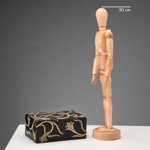 Hand-painted and carved stone jewelry box with a decoration depicting intertwined flowering branches on a black...