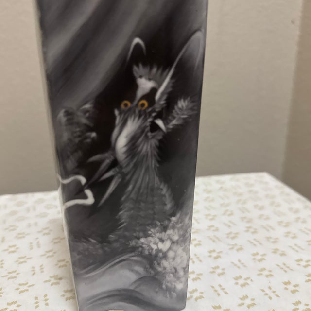 Striking and richly detailed, this vintage Noritake dragon vase by Nippon Toki Kaisha is a captivating example of early...