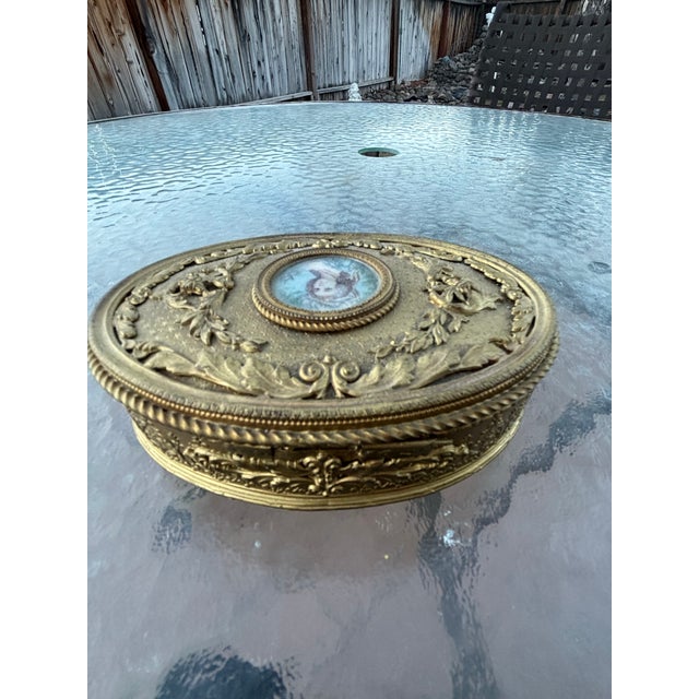 1850's French Bronze Portrait Box with hand painted portrait under glass signed by the artist. This box is in amazing...