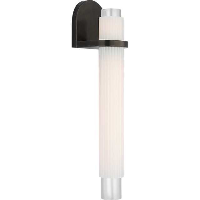 Arena 20" Sconce in Bronze with White Ribbed Glass Designer: Windsor Smith Finish: Bronze Height: 19.75" Width: 4.5"...