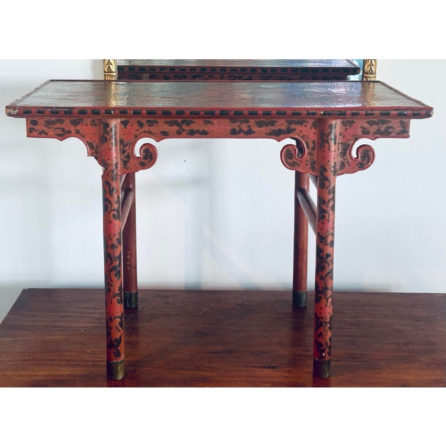 19th C. Chinese red lacquered wood drinks/side table decorated with a flowering tree and grand peacock. Eye catching table...