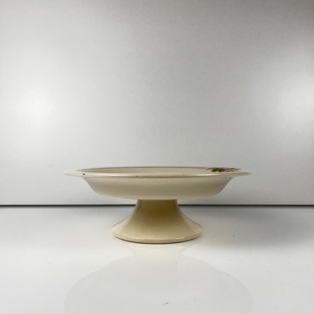 Longwy Compote Dish, early 20th century, Floral decoration Glazed earthenware Dimensions: Diameter: 22.5 cm Height: 8 cm...