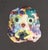 A 1970s ceramic tile by the American artist Mark Bulwinkle (born 1946). This ceramic piece depicts an abstract face...