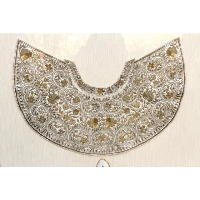 The Sovereign Cope is a monumental study in 19th-century luxury and global collaboration. This large-scale horizontal...