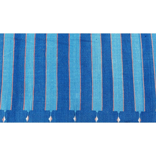 Vintage Striped Indian Dhurrie Rug Size: 15'2" × 18'1" (462 × 551 cm) This striking vintage Indian Dhurrie rug captivates...