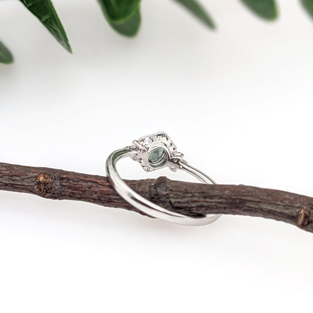 This beautiful ring features a 0.34ct natural Alexandrite with natural earth mined diamonds set in solid 14K gold. This...