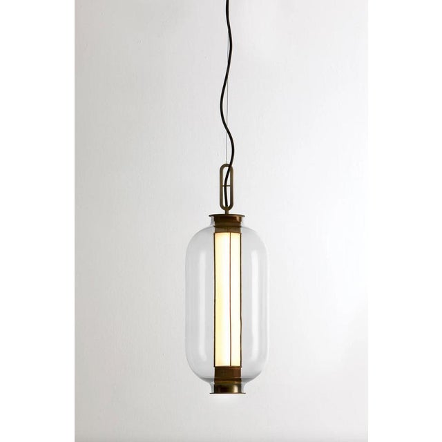 Neri and hu bai t ba ba bronze- transparent glass diffuser suspension lamp for parachilna this collection is inspired by...