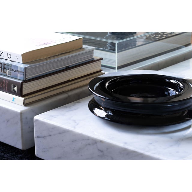 Double-edged cased black glass dish or bowl by Murano artisan Renato Anatra from the 1980s. With a black core surrounded...