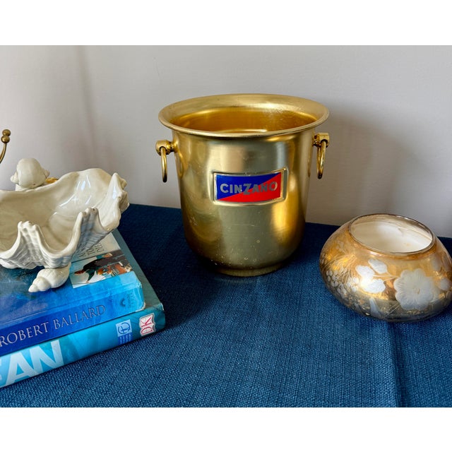 Add a touch of Italian elegance to your entertaining with this mid-century Cinzano champagne bucket. Elevate your...