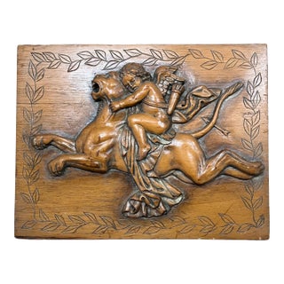 Bas Relief Hand-Carved Wall Panel of a Cherub (Putto) Riding a Lion For Sale