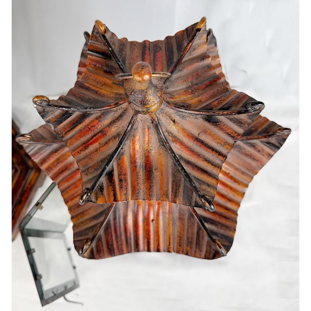 This is a pair of decorative lanterns designed in the form of traditional pagoda pavilions. Each lantern features a tiered...