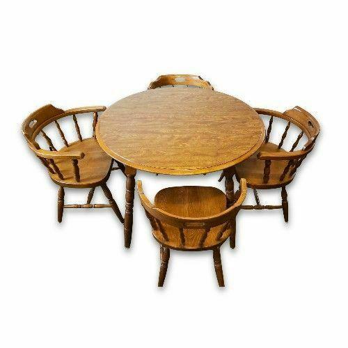 Mid-century Colonial Revival 7-piece dining suite crafted from ultra-durable solid Hard Rock Maple in the former...