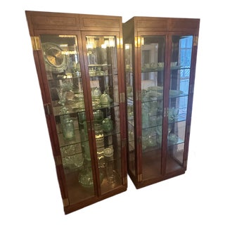1960s Attributed to Henredon Campaign Style Lighted Display Cabinets (2) For Sale