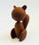 A mid century turned wood figurine in the shape of a squirrel. Adorable stylized features. Made in Japan by Senshukai as...