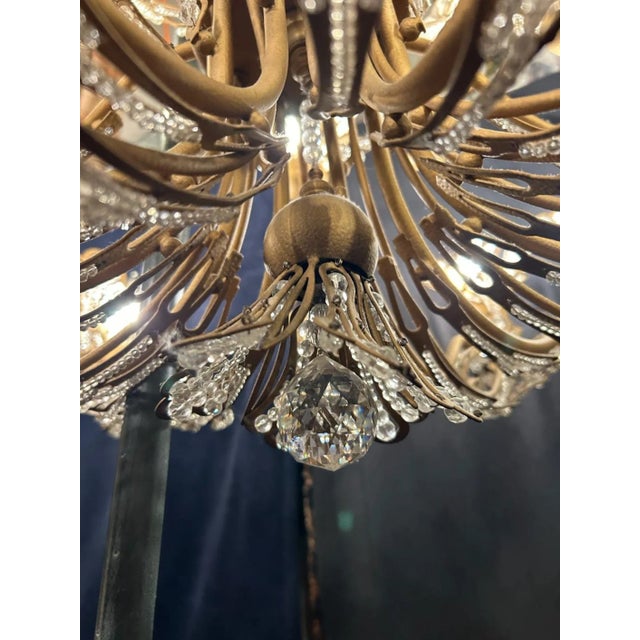 The two largest Schonbeck crystal chandeliers in the Rivendell design are 15 and 16 light. This is the 15 light chandelier...