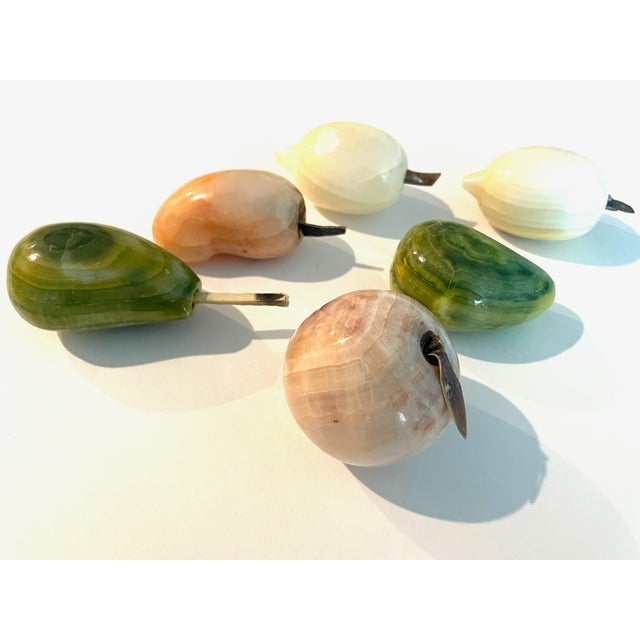 Variety of fruits, made of hard stones, in style of Chalcedony (Chinese) in Vintage era. The fruits are in kidney shape,...
