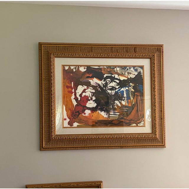 Striking framed Salvador Dali lithograph titled Vinea Electa from the celebrated Biblia Sacra series. This richly colored...