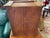 19th century mini chest with six drawers. Sloped front construction makes this a really unique item. Has had some repairs,...