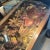 carved wood flowers in glass top table. Would also look great with the legs chopped and hung on the wall. fabulous piece!...