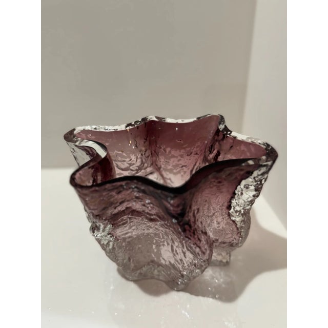 Iconic Finnish “Liepukka” model designed by Kaj Blomqvist for Kumela in the 1970s. Thick amethyst and clear glass with the...