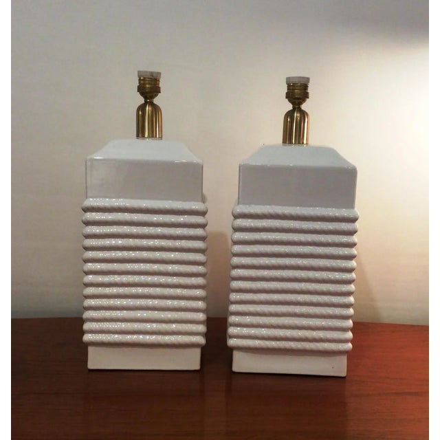 These Elegant Pair of table lamps were designed and produced in Manises ( (Valencia, Spain) in the sixties. They are made...