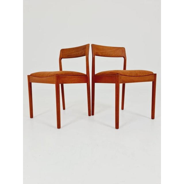 Danish teak dining chairs by Johannes Norgaard, 1960s, set of 2. The chair frames are made from solid teak and are in...