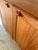 This teak chest of drawers is an absolutely exquisite design by the renowned designer H. W. Klein and a prime example of...
