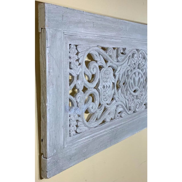 Beautiful hand-carving wood wall hanging from solid wood, with vine, Crown flowers and motifs,hand-painted in gray color....
