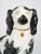 Porcelain sculpture depicting King Charles Spaniels, 20th century. Porcelain sculpture depicting King Charles Spaniels,...