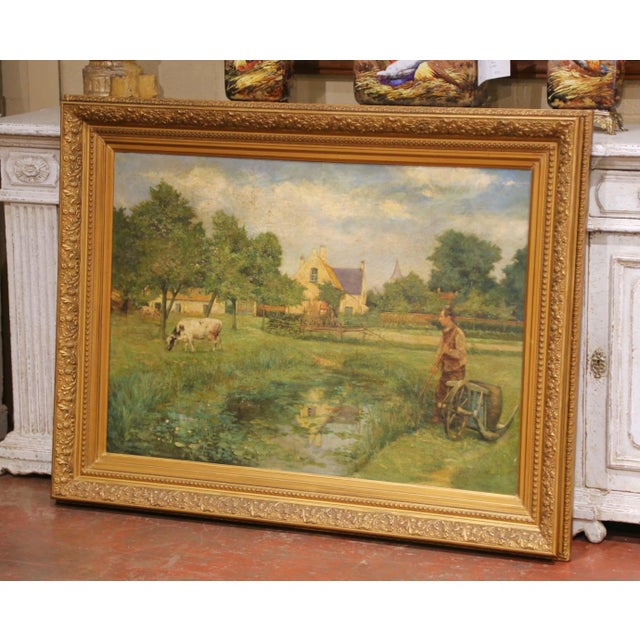 This impressive antique French oil painting, created circa 1870, presents a tranquil pastoral landscape rendered in the...