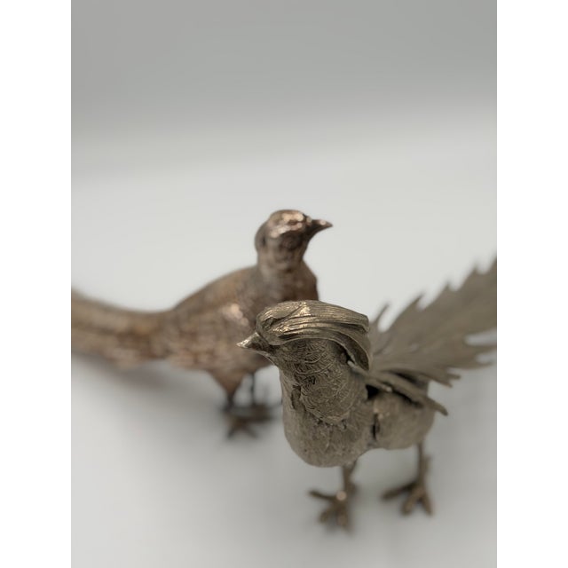 Perfect for the dining table, sideboard or Hall console or wall brsckets. These male and female silverplate pheasant would...