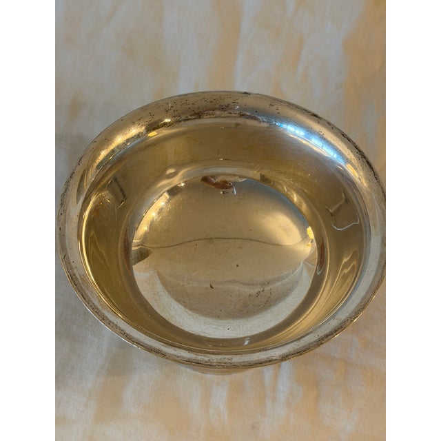 Vintage footed sterling silver bowl with a sleek, understated design. Unadorned and elegant, this piece has a timeless,...